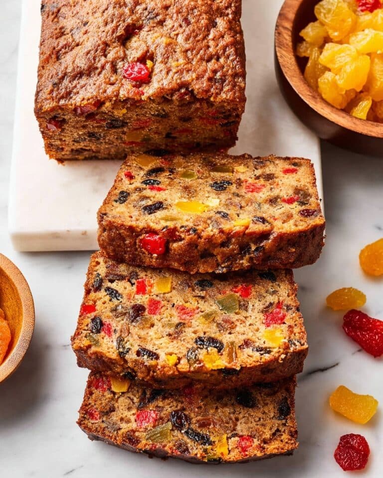 Fruit Cake with Dried Fruits, Candied Cherries, and Rich Rum Infusion Recipe