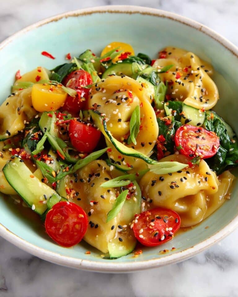 Potsticker Salad with Heirloom Tomatoes, Cucumber, Basil, and Sesame Dressing Recipe