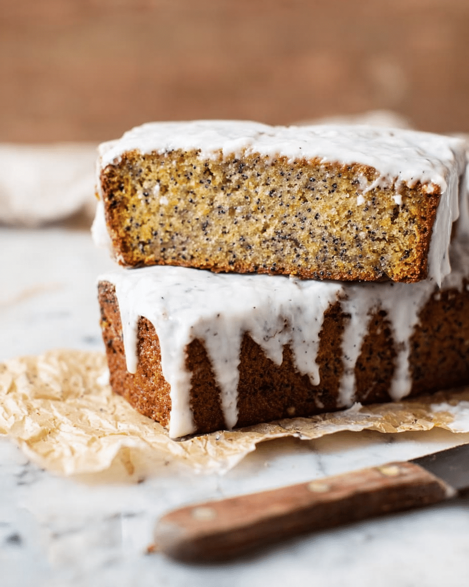 The image shows two slices of a loaf cake stacked on top of each other, each with a thick layer of white frosting covering the top and partially dripping down the sides. The cake itself is golden brown with dark specks evenly spread throughout, suggesting a nut or seed texture inside. The slices rest on a piece of crumpled parchment paper, placed on a white marbled surface. To the right of the cake, there is a knife with a wooden handle lying flat. Photo taken with an iphone --ar 4:5 --v 7