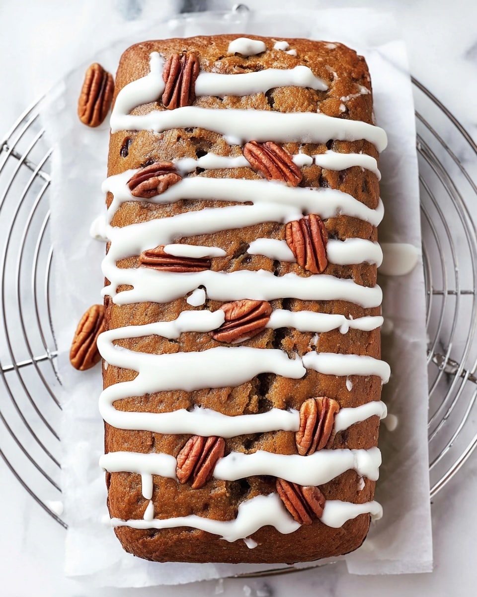 A rectangular brown cake with a slightly cracked and rough texture sits on white parchment paper over a wire rack on a white marbled surface. It has five thick, uneven white icing stripes drizzled horizontally across the top. Scattered on the cake and partially resting on the icing are several whole pecan halves, adding a rich brown color and a crunchy texture. The cake looks moist and dense, with a warm, home-baked appearance. Photo taken with an iphone --ar 4:5 --v 7